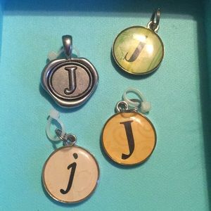 4 letter J charms